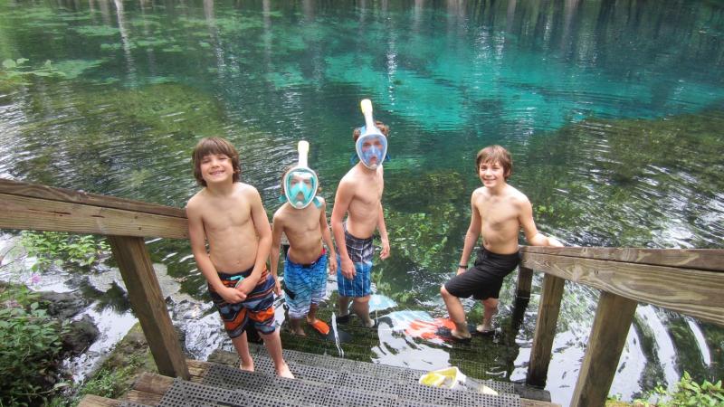 Four boys ready to swim or snorkel at Manatee Springs State Park